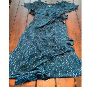 Flowy, blue wrap dress with ruffle sleeves